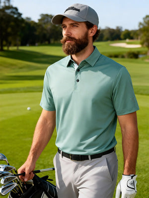 Model in beryl green everyday classic solid polo holding a golf club outdoors, waist-up shot