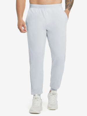 Model wearing Water Resistant Comfy Fleece Golf Joggers in misty grey, lower body front view