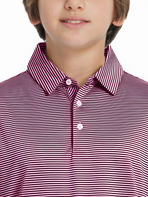 Front view of youth wearing pink blue stripe performance cooling polo, showing collar and chest fit