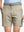 Front waist to knee view of khaki water resistant golf 7 inch shorts, clean athletic fit.