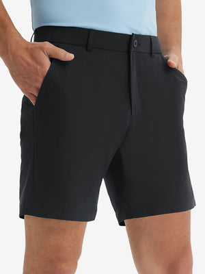 Front lower body shot of model wearing the black stretch soft flat front dress golf shorts, showcasing the fit