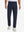 Model wearing Golf Lightweight Fleece Lined Dress Pants in navy, lower body front view