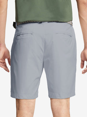 Back waist to knee view of grey water resistant golf 9 inch shorts, flexible performance fit.