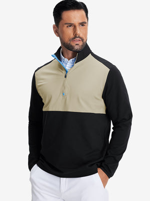 Model front upper body wearing Fleece lined golf quarter zip with sleek black/grey look