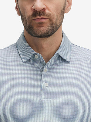 Front view from nose to chest of model wearing white light blue grid ultra-light quick dry moisture wicking collared polo shirt
