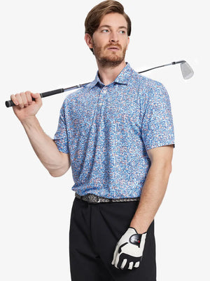 Model wearing the blue doodles pattern polo, showcasing its sporty design and modern artistic flair