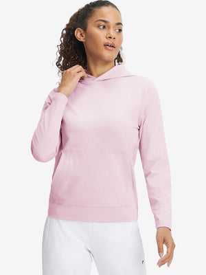 Model holding hoodie cap with both hands, wearing women's lightweight hoodies pullover in pale pink.