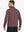 Back half-body view of model in BRICK HEATHER Quarter Zip Melange Pullover highlighting smooth fit.