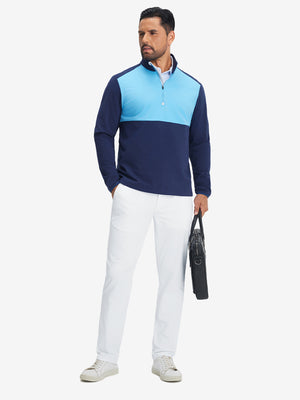 Model carrying a tennis bag, wearing white soft lightweight casual golf pants with 5 pockets.