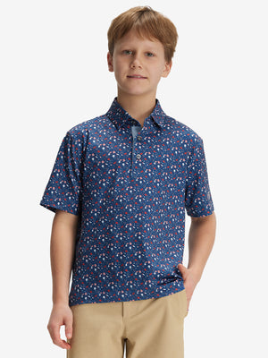 Front half-body of boy in american elements performance print boys golf polo