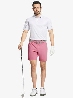 Full body front view of model wearing PINK 7 Inch Heather Performance Golf Shorts, holding a golf club