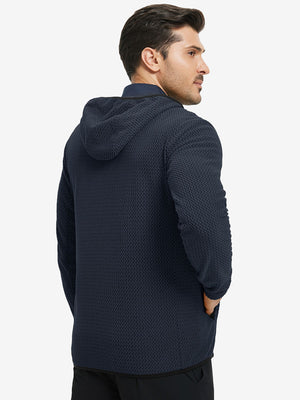 Back upper view of model in full zip fleece hoodied jacket, showing fit and seams in navy.