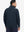 Back upper-body view of water-resistant zip up golf jacket on model, shown in navy.