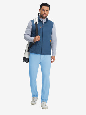 Model carrying a tennis bag, wearing light blue soft lightweight casual golf pants with 5 pockets.