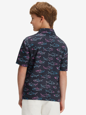 Back half-body of boy in ombre shark performance print boys golf polo