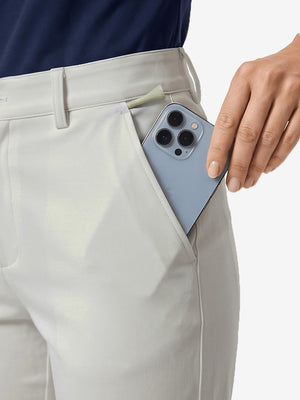 Detail view of front pocket on silver grey women's regular fit stretchy golf pants