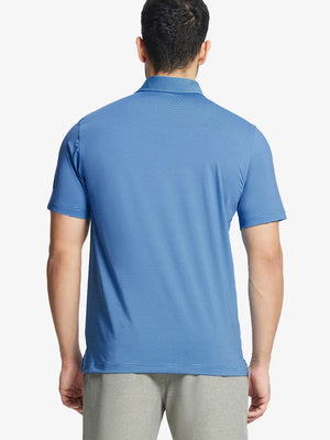 Back half-body view of AQUA STRIPE Pinstripe Jersey Performance Polo worn by model								
