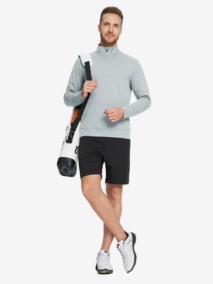 Full-body view of model carrying golf bag in quarter zip melange pullover lunar rock melange.