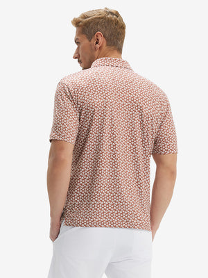Back waist-up shot of model wearing brick white flower performance quick dry print golf polos