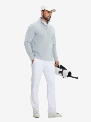 Model carrying golf bag in Fleece lined golf quarter zip with versatile grey mist look