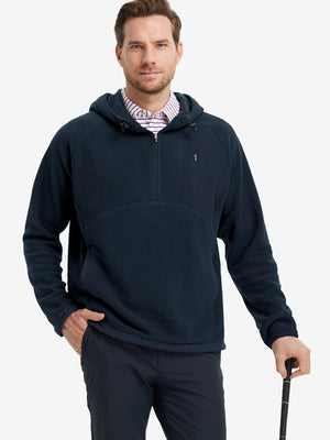 Model holding a golf club, dressed in Navy Quarter Zip Polar Fleece Sweatshirt, sporty fit.