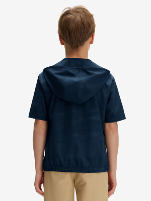 Back waist-up shot of model wearing navy water-resistant short sleeve q-zip hoodie for boys