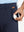Golf ball sliding into pocket of Quick Dry Casual Shorts in Navy, practical sports detail.