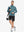 Full-body front view of model wearing AQUA HEATHER Quarter Zip Melange Pullover with backpack, sporty casual look.