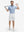 Full-body shot of model holding a golf club in light blue ultra-light quick dry moisture wicking collared polo shirt