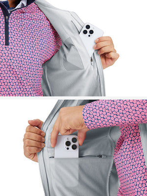 Close-up detail showing phone in the pocket of sleeveless softshell fleece outdoor vests with 6 pockets in light gray