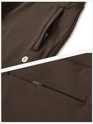 Detailed view of the front side pocket on women's stretch fleece lined water resistant joggers in coffee brown, showing stitching and design.