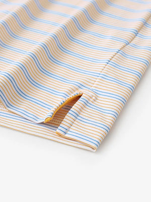 Close-up of side hem slit on Orange Blue Stripe Performance Stripe Golf Shirt