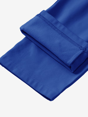 Boys Stretch Fleece Lined Casual Golf Pants in klein blue, flat lay showing fleece lining