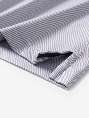 Hem detail of Long sleeve pinstripe jersey polo with neat finish in grey white stripe