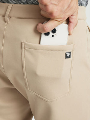 KHAKI Water-Resistant Fleece Lined Pants, back pocket detail with iPhone inserted