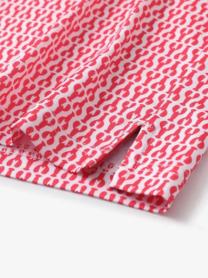 Hem slit detail of MAELREG Performance Jersey Print Polo in Red Lobster – comfort & movement