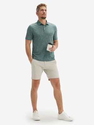 Full-body shot of model in green leaf breathable jacquard pattern 3-button golf polo