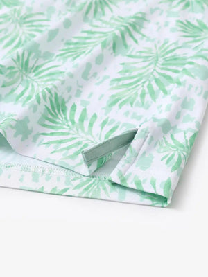 Hem slit detail of MAELREG Performance Jersey Print Polo in Light Green Leaf – comfort & movement