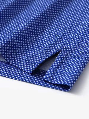 Hem slit detail of MAELREG Performance Jersey Print Polo in Blue Swordfish – comfort & movement