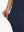 Close-up of the fabric stretch on the navy women's lightweight high waisted golf pants, emphasizing flexibility