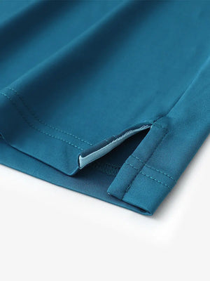 Close-up of side slit detail on DUSTY BLUE Chest Print Polo Shirts