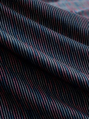Fabric close-up of Performance yarn dye striped polo showing crisp stripes and space dye stripe detail