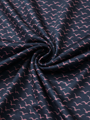 Fabric detail of Stylish print boys polo shirts with soft feel and navy pink seagull pattern