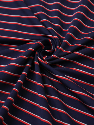 Close-up of navy/red stripe popular yarn dyed stripe polo fabric showing crisp lines and soft texture.