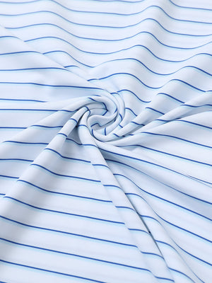 Close-up fabric view of youth performance golf polos, smooth texture with breathable white/light blue stripe finish