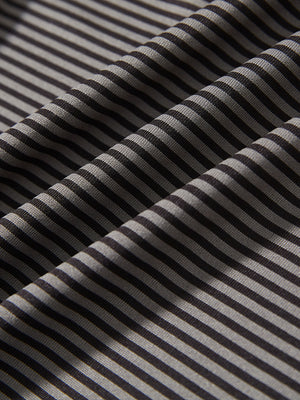 Fabric detail of Classic stripe polo shirts with crisp lines and smooth black stripe finish