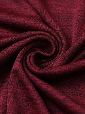 Close-up of wine heather modern fit melange polo fabric showing soft and textured surface.