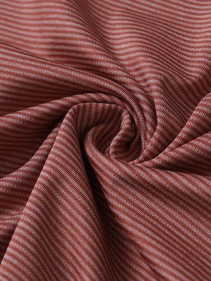 Close-up of brick melange pinstripe quarter zip pullover fabric showing fine lines and soft knit texture.