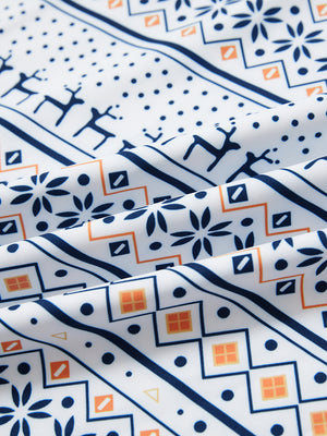 Full print lightweight quarter zip pullover, close-up of smooth fabric with detailed print in christmas snowflake