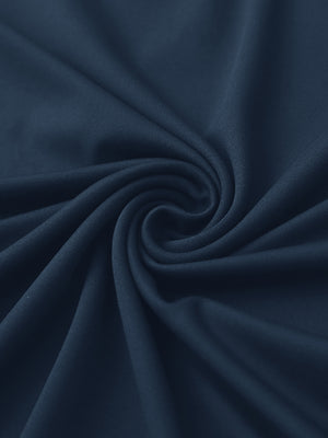 Close-up of fabric on stylish chest print snap polo, showing texture and finish in navy.